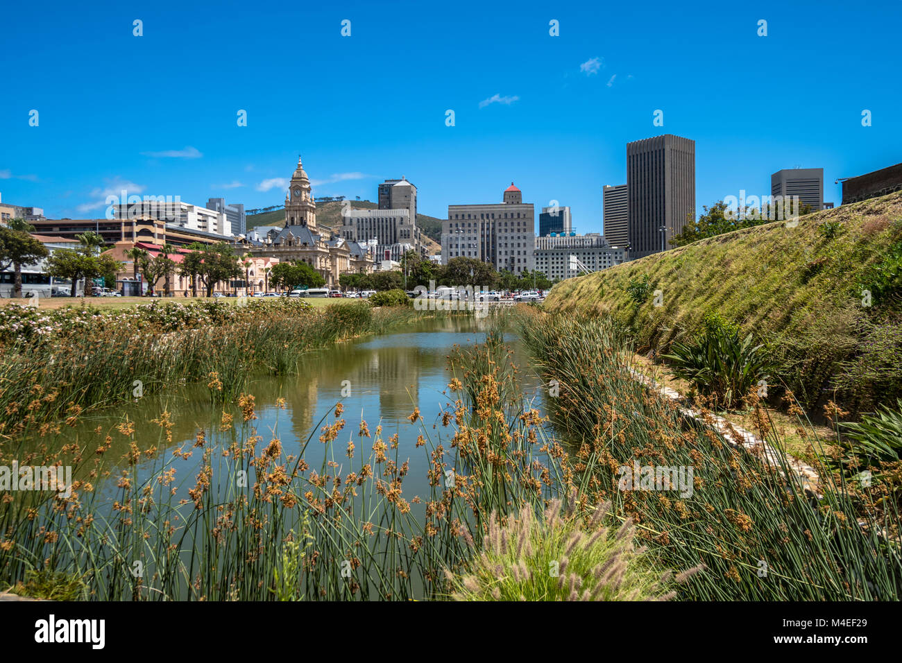 City skyline and moat at Castle of Good Hope, Cape Town, Western Cape, South Africa Stock Photo