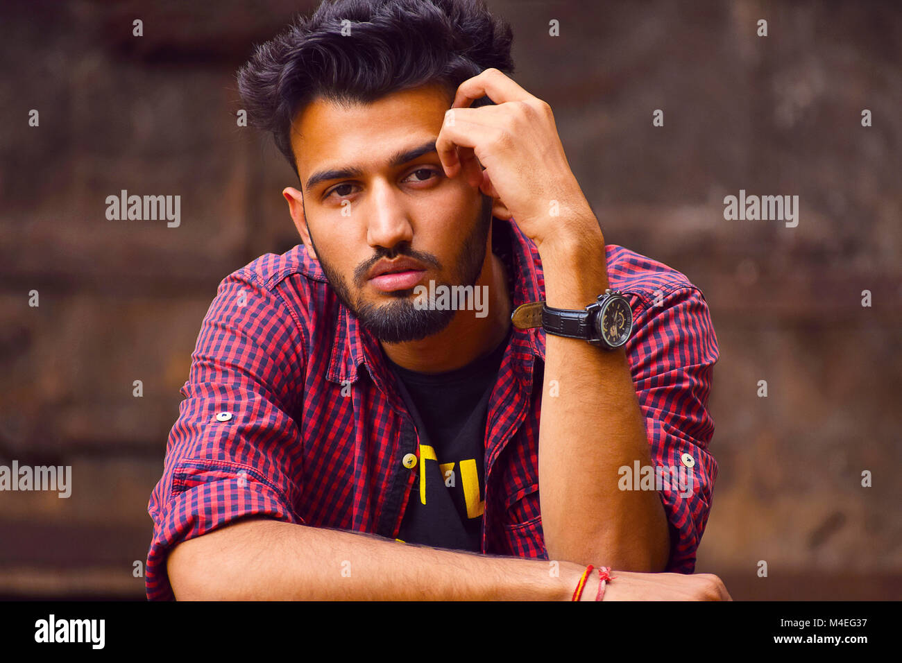 Indian man laughing hand on hi-res stock photography and images - Alamy