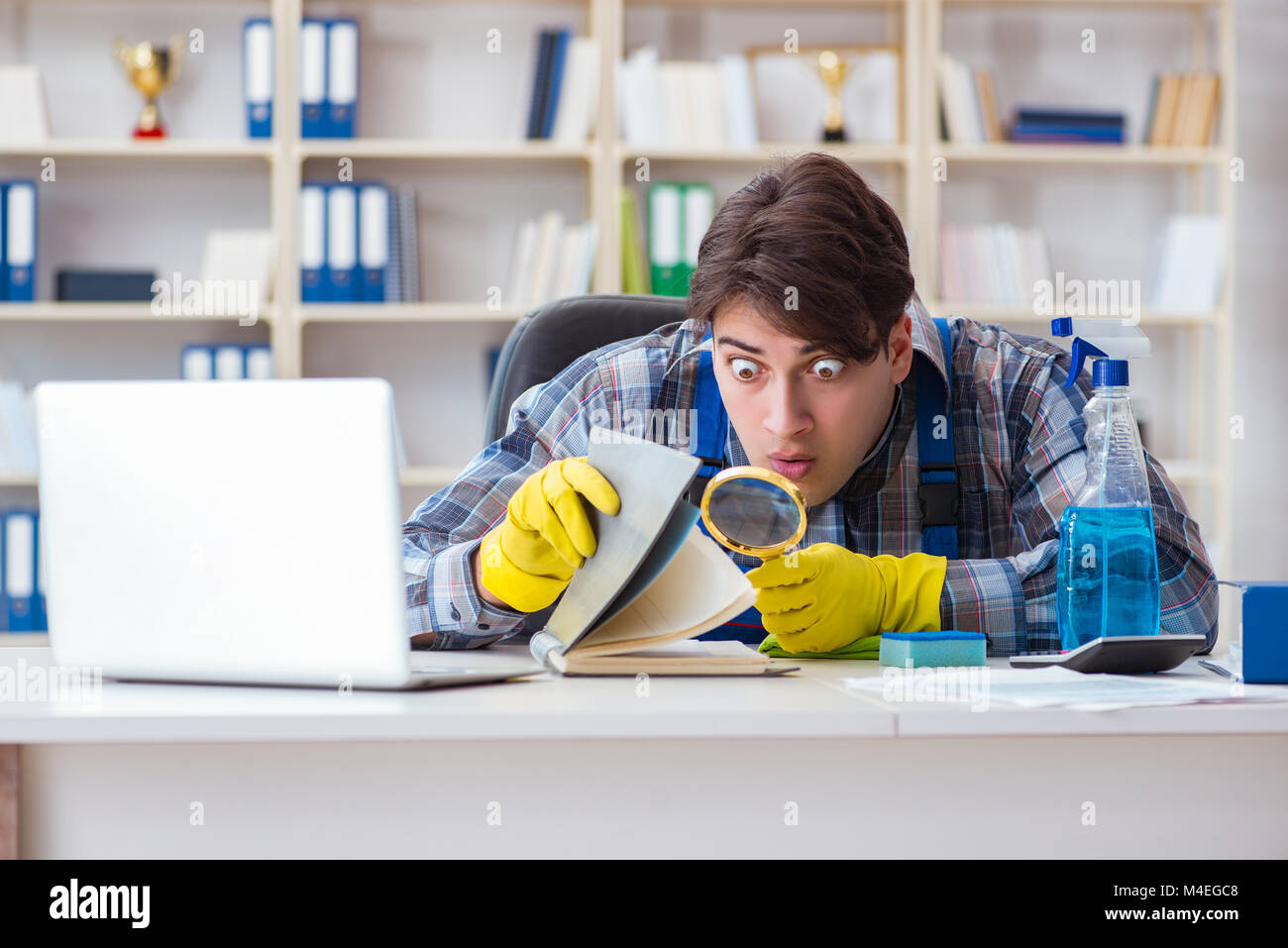 Man cleaner stealing confidential documents Stock Photo - Alamy