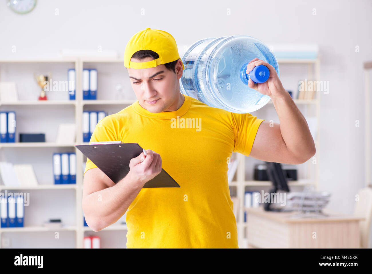 Man holding water bottle hi-res stock photography and images - Alamy