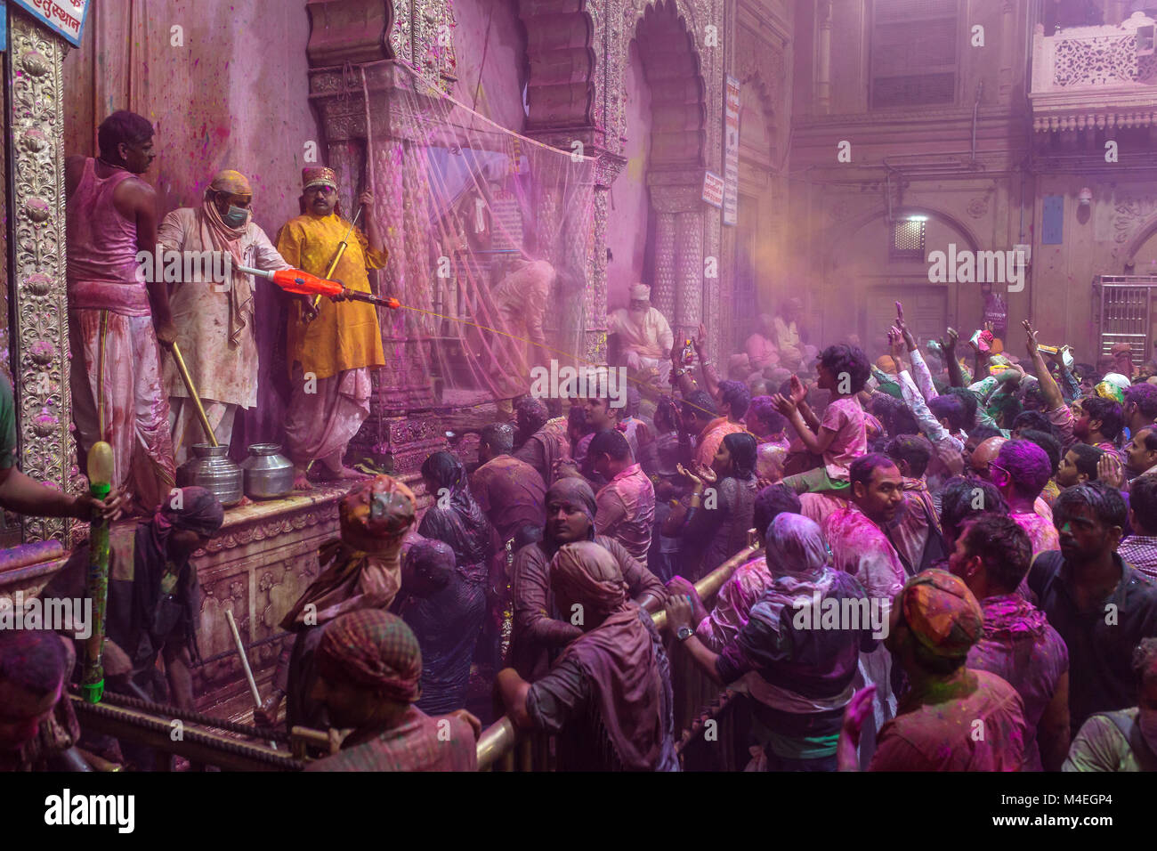 Vrindavan, India - March 20, 2016: Holi celebration in the Hindu Banke Bihare temple in Vrindavan, Uttar Pradesh, India. Stock Photo