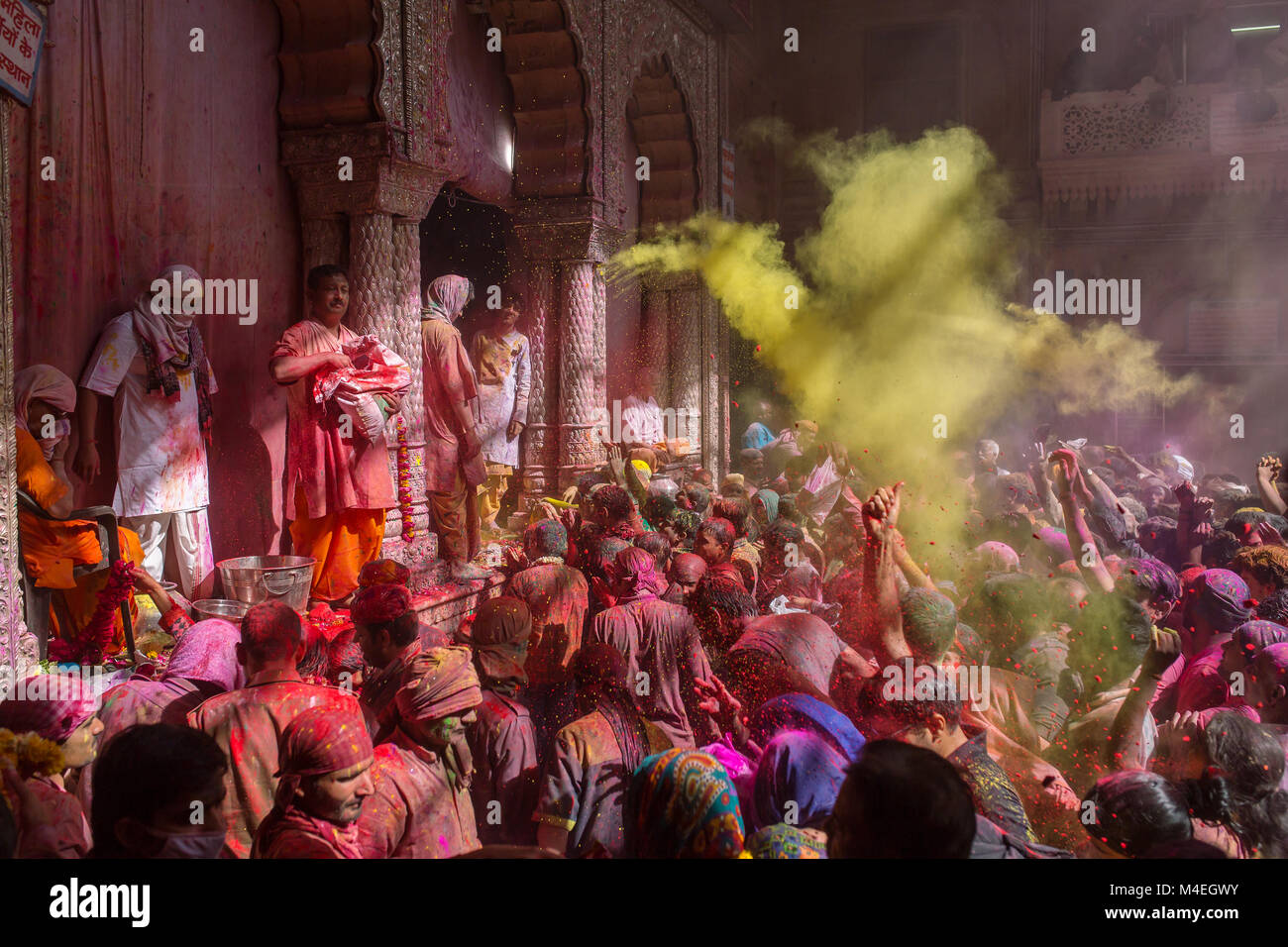 Vrindavan, India - March 22, 2016: Holi celebration in the Hindu Banke Bihare temple in Vrindavan, Uttar Pradesh, India. Stock Photo