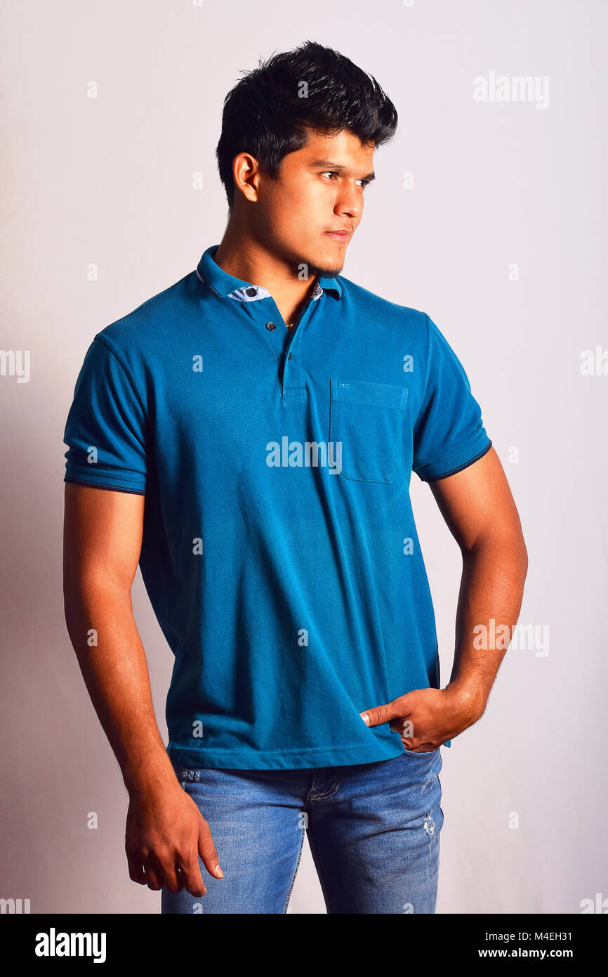 Young man in casual dress posing for camera, Pune, Maharashtra. Stock Photo