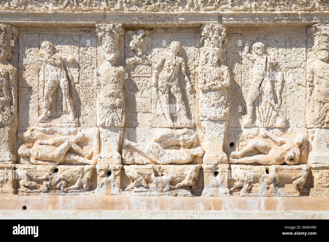 The greek fountain is located in Gallipoli, near the bridge that connects the new town to the old town. This fountain is the oldest in Italy, and is s Stock Photo