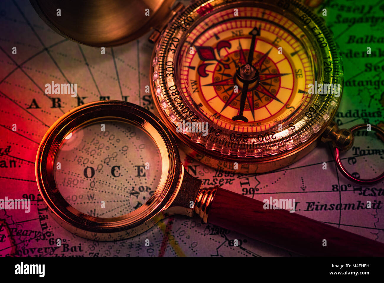 compass and magnifying glass Stock Photo Alamy