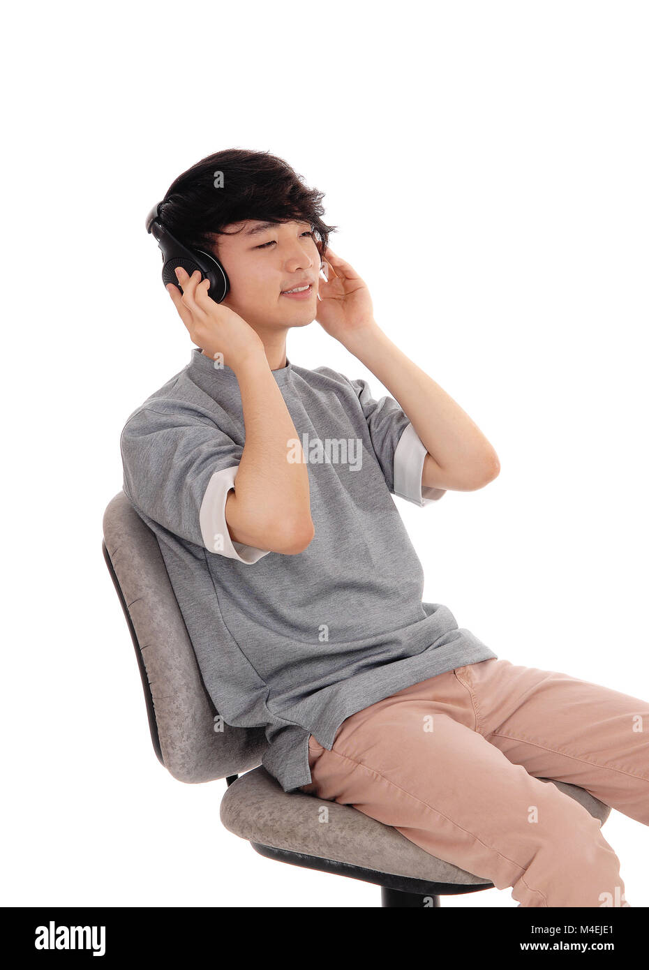 Asian man listen head phone. Stock Photo
