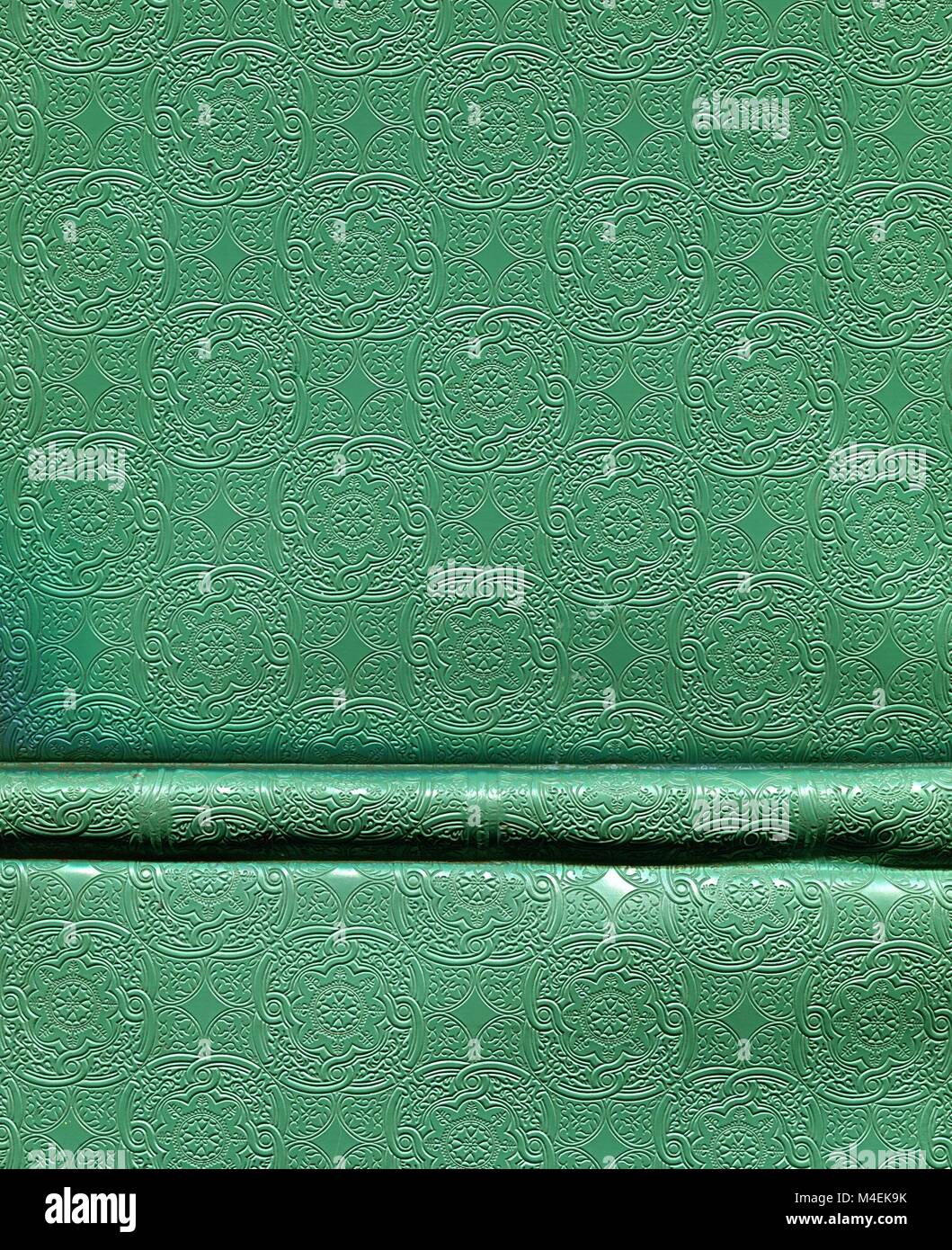 green book cover with embossed motifs Stock Photo