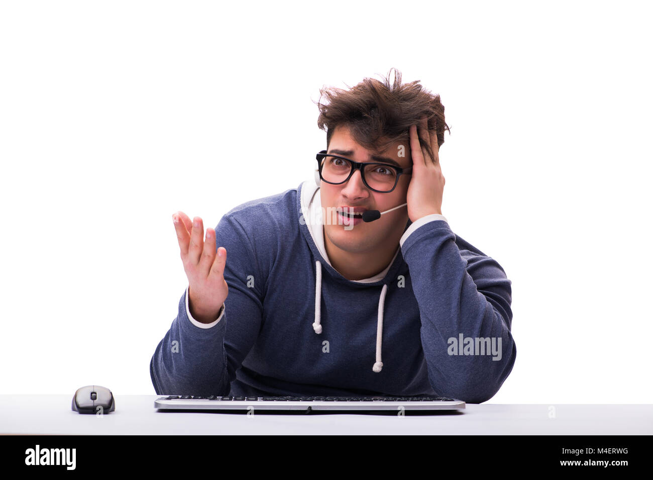 Funny nerd man working on computer isolated on white Stock Photo