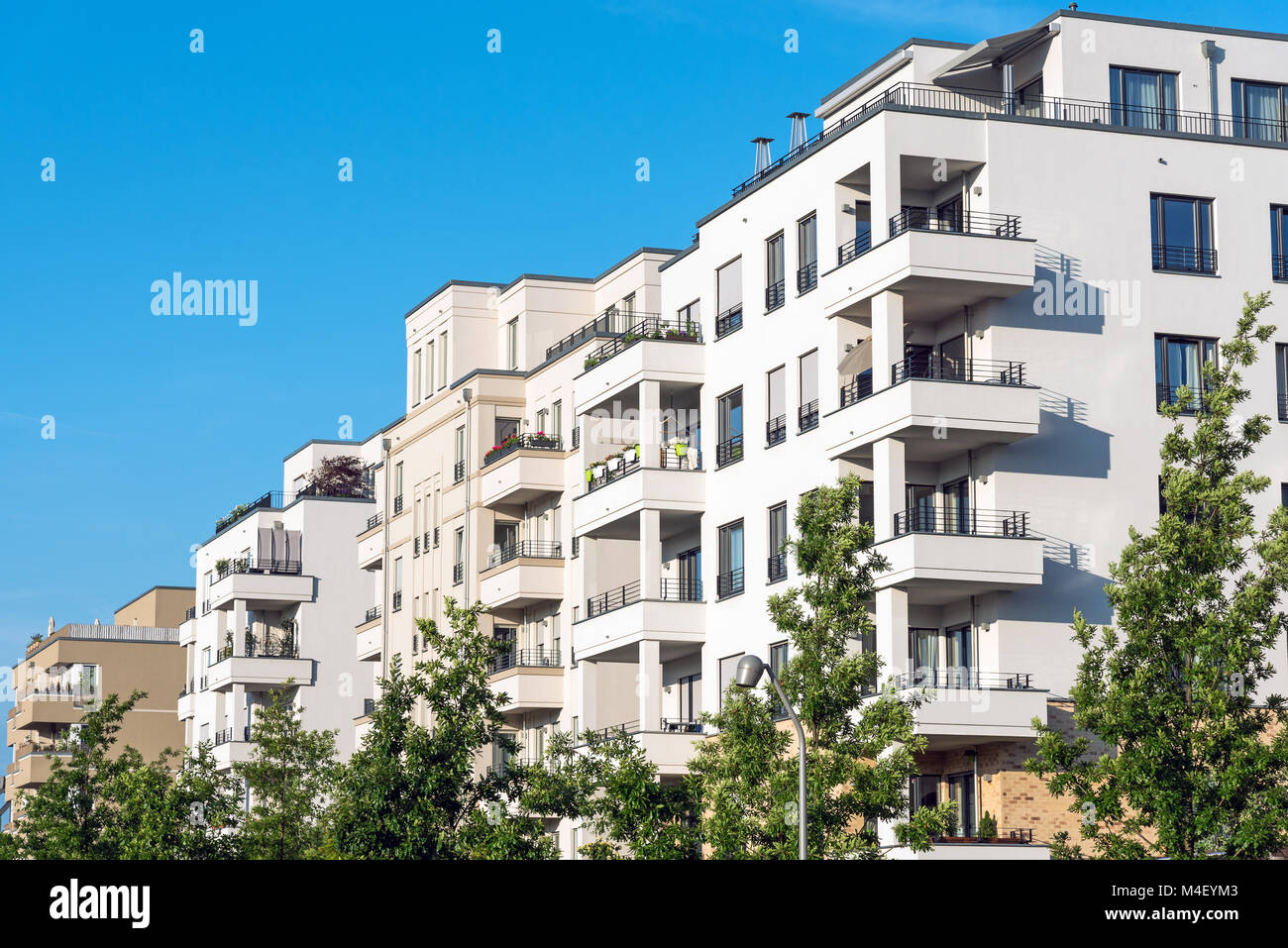 New white apartment houses seen in Berlin, Germany Stock Photo - Alamy