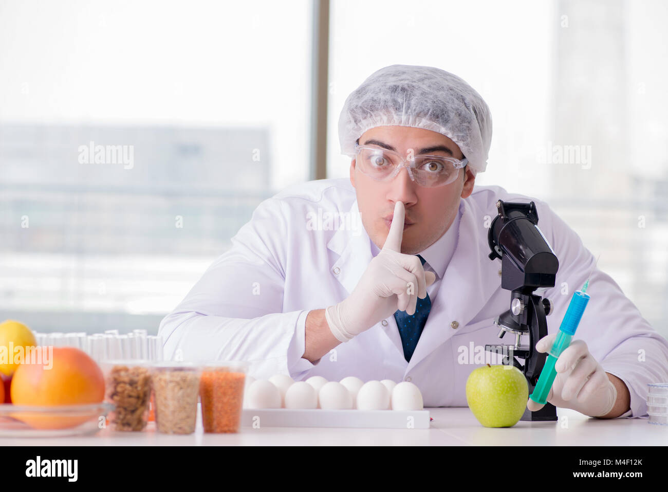 Nutrition expert testing food products in lab Stock Photo Alamy