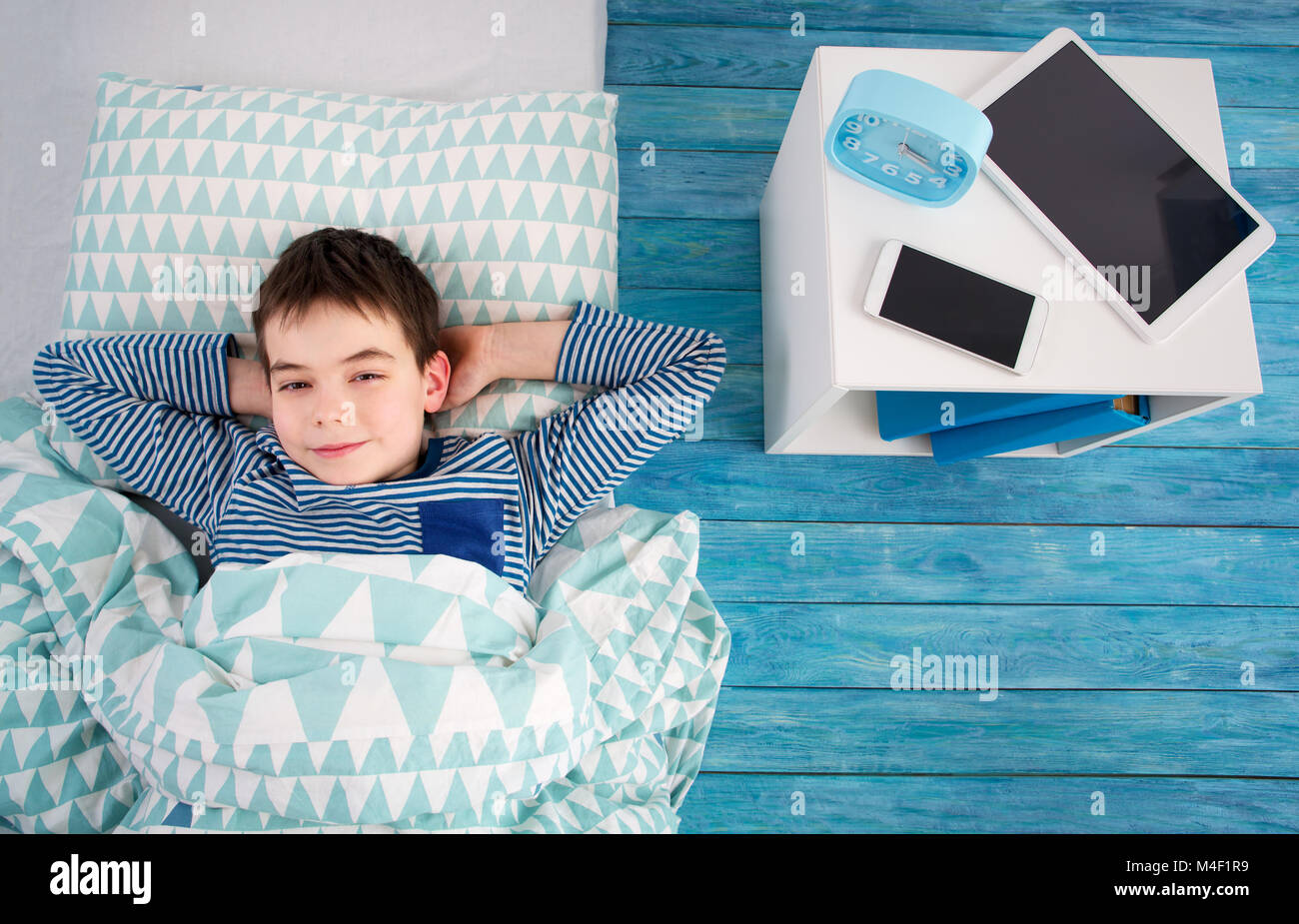 eight years old child sleeping in bed on pillow Stock Photo Alamy