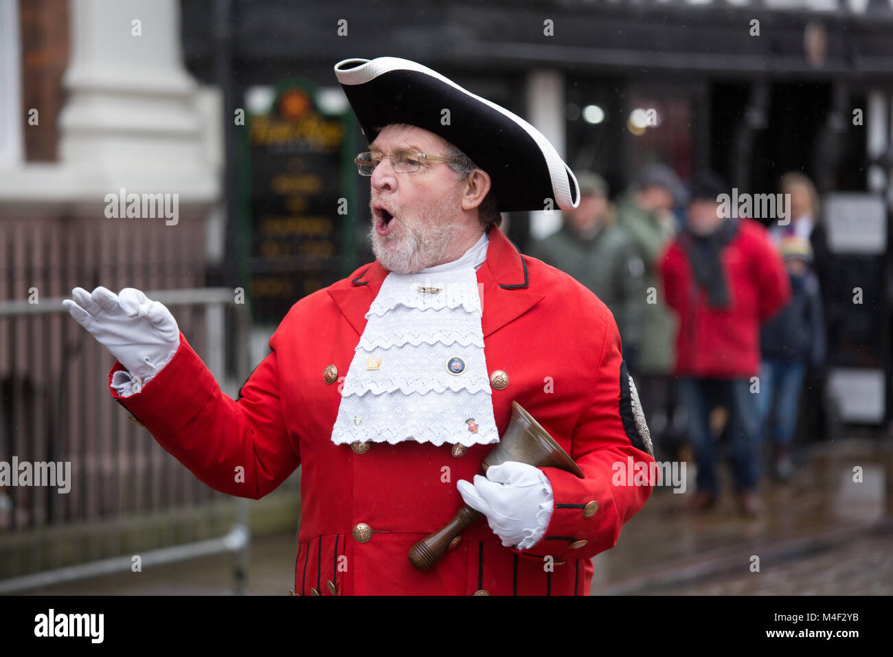 Lichfield Town Crier Ken Knowles calling during the annual pancake race