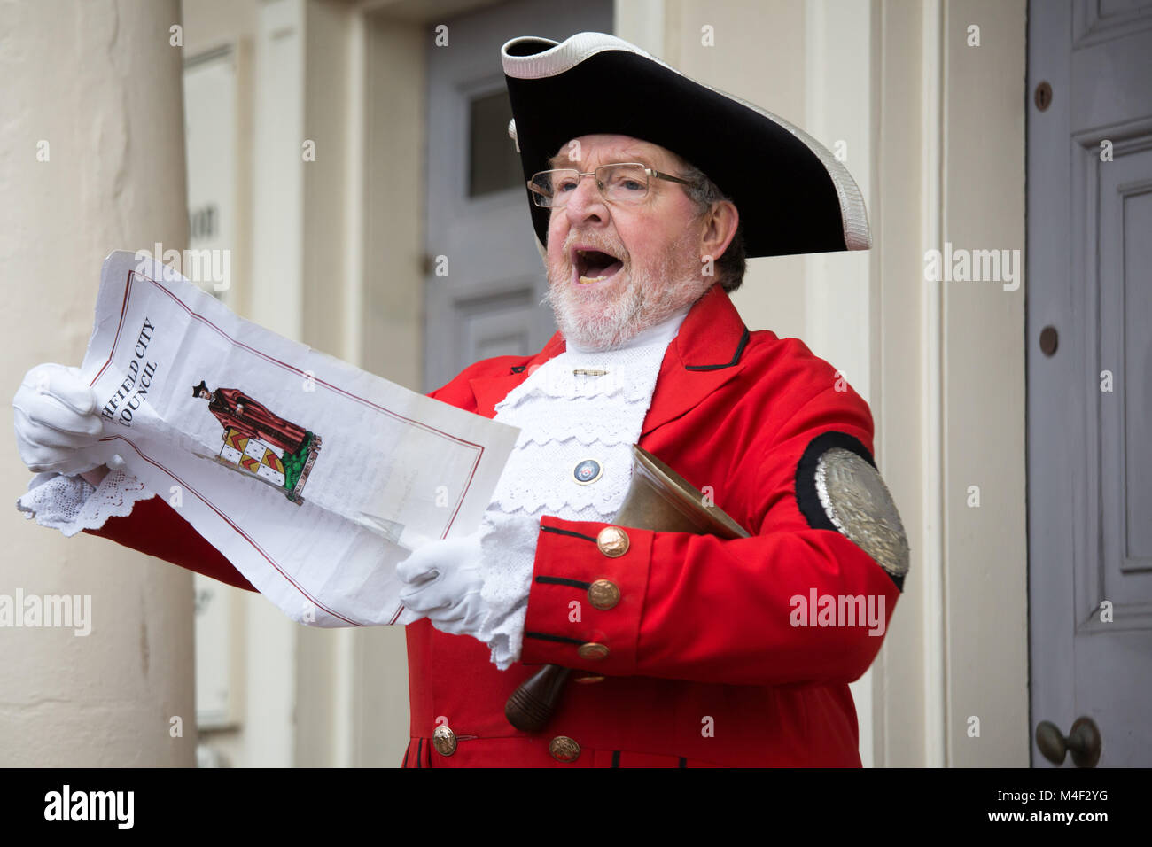 Lichfield Town Crier Ken Knowles calling during the annual pancake race