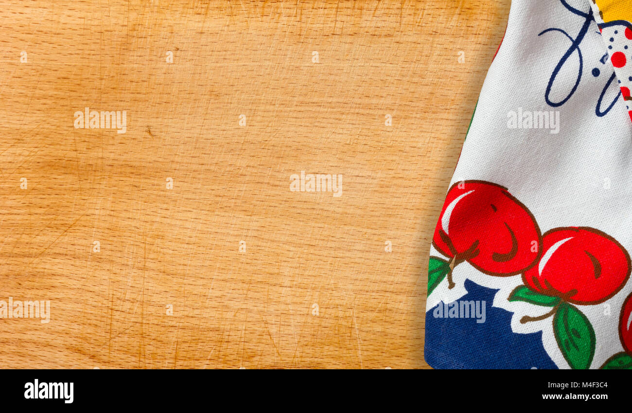 Decorated cloth placed on the right side of an old wooden background Stock Photo