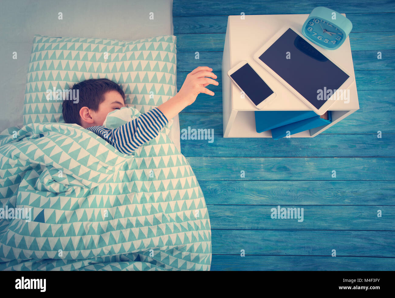 Boy asleep floor hires stock photography and images Alamy