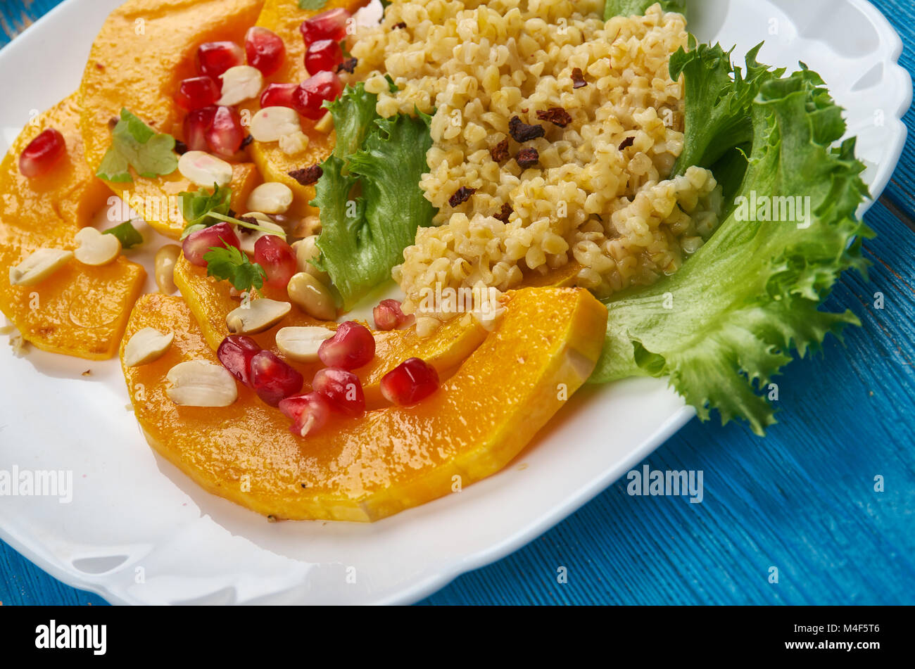 Roasted Delicata Squash Salad With Bulgur Stock Photo