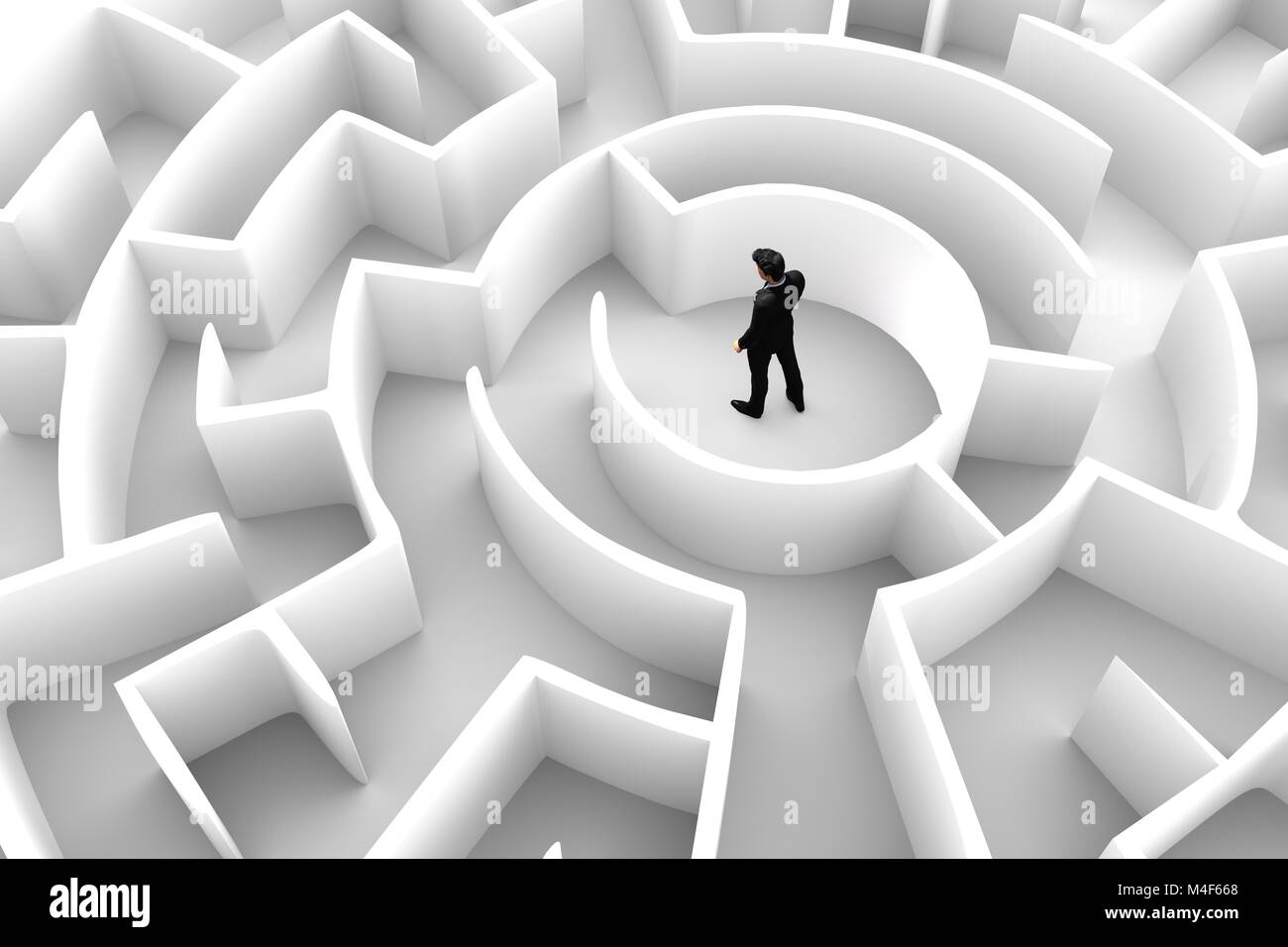 Businessman in the middle of the maze. Challenge concepts Stock Photo
