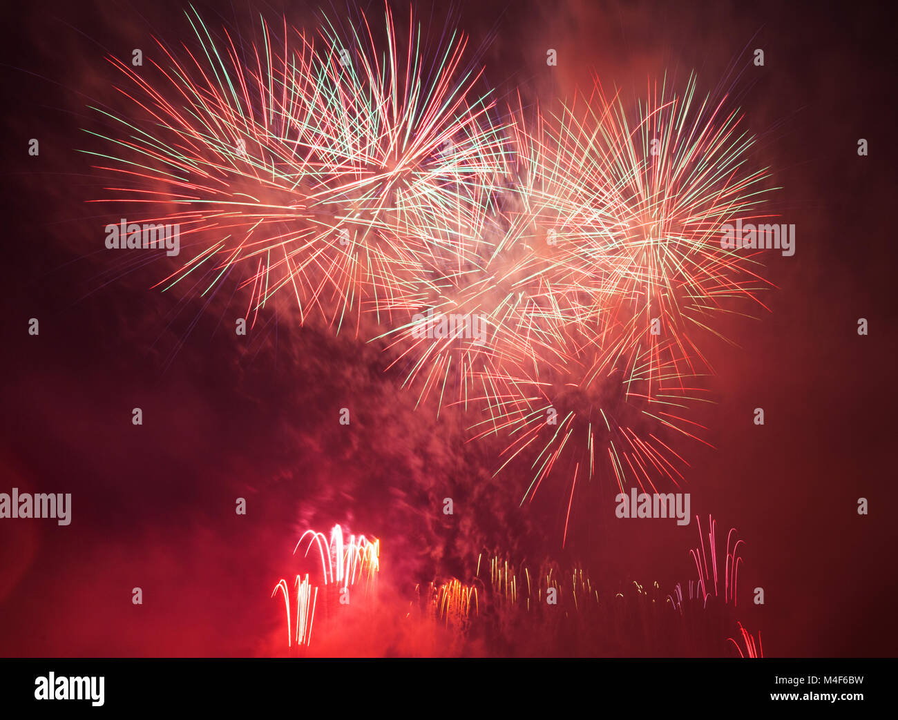 Spectacular fireworks show light up the sky. New year celebration Stock