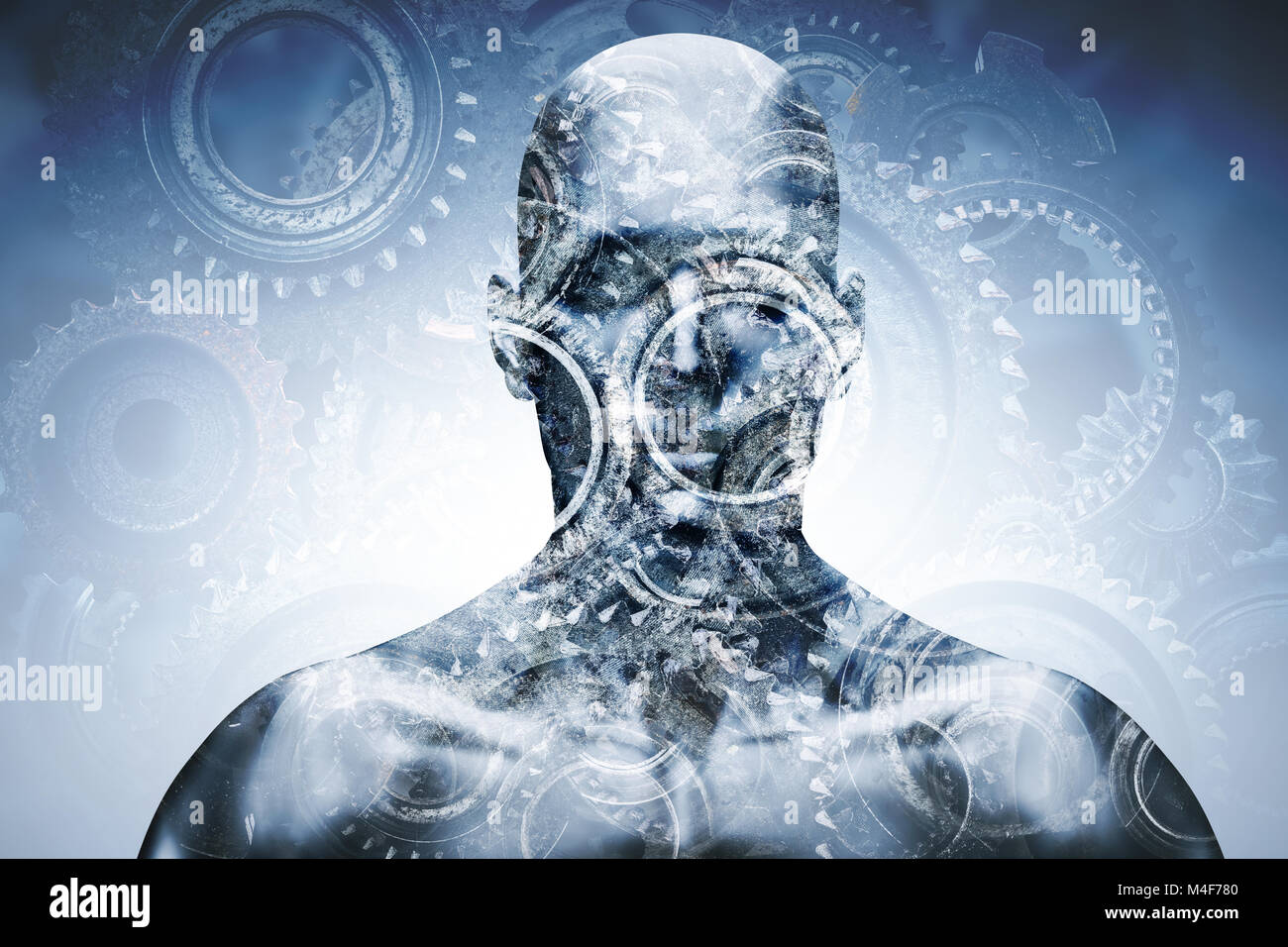 Man face with mechanical cogwheel overlay. Stock Photo