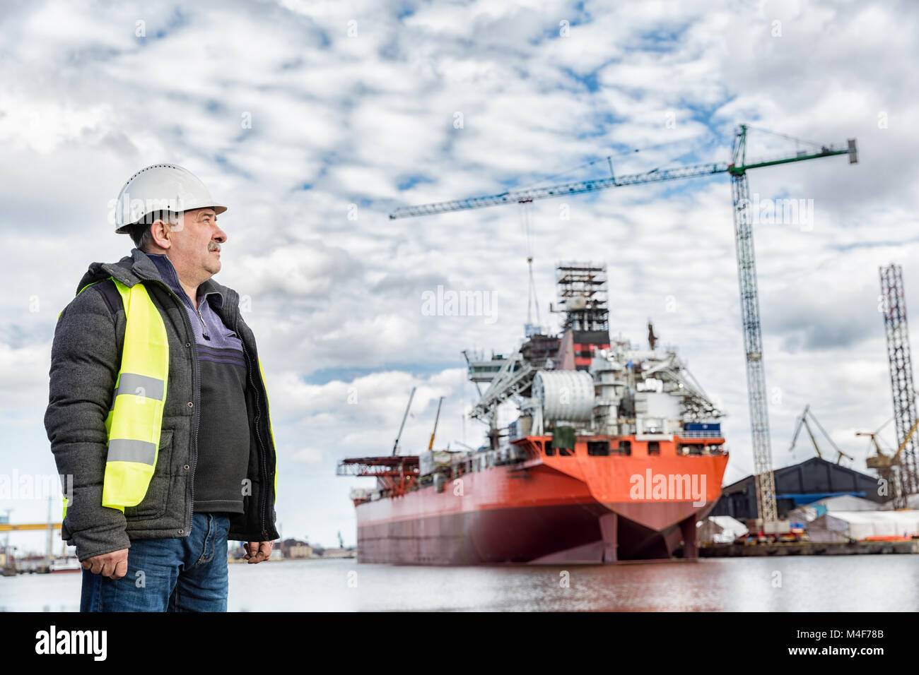 Shipbuilding engineer at the dockside in a port. Stock Photo