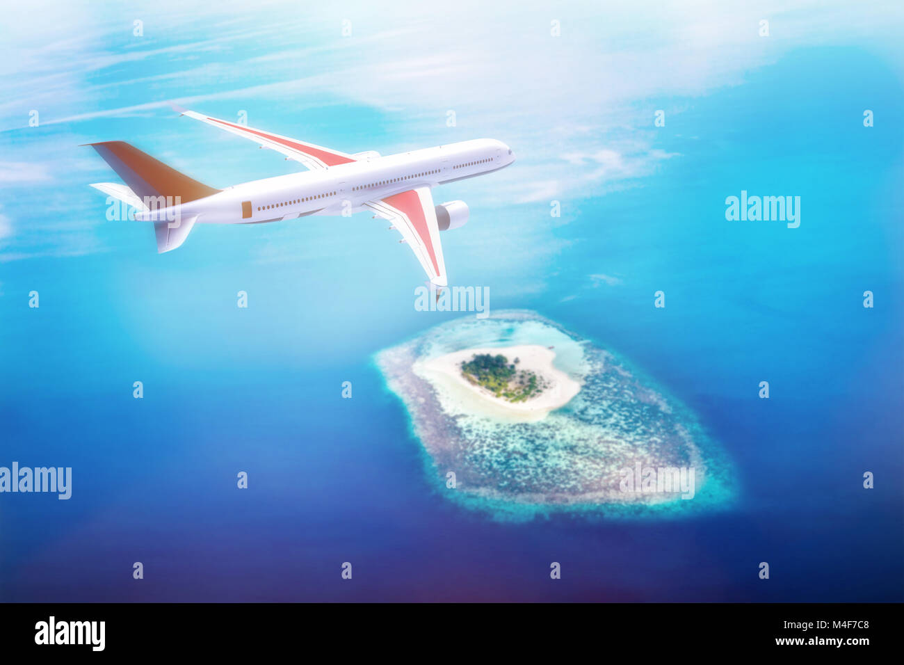 Airplane flying over Maldives islands on Indian Ocean. Travel Stock Photo