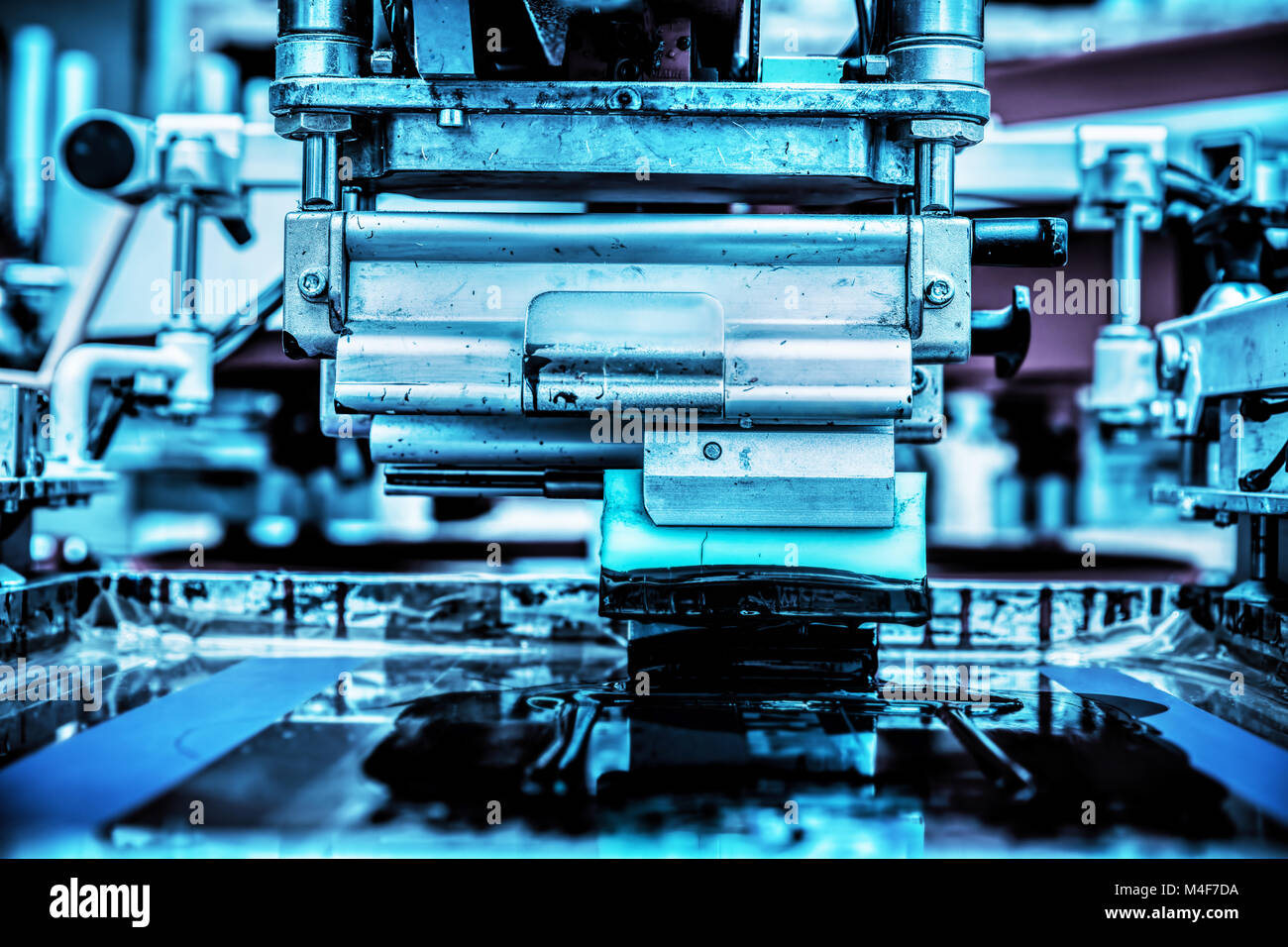 Industrial metal printing machinery. Stock Photo