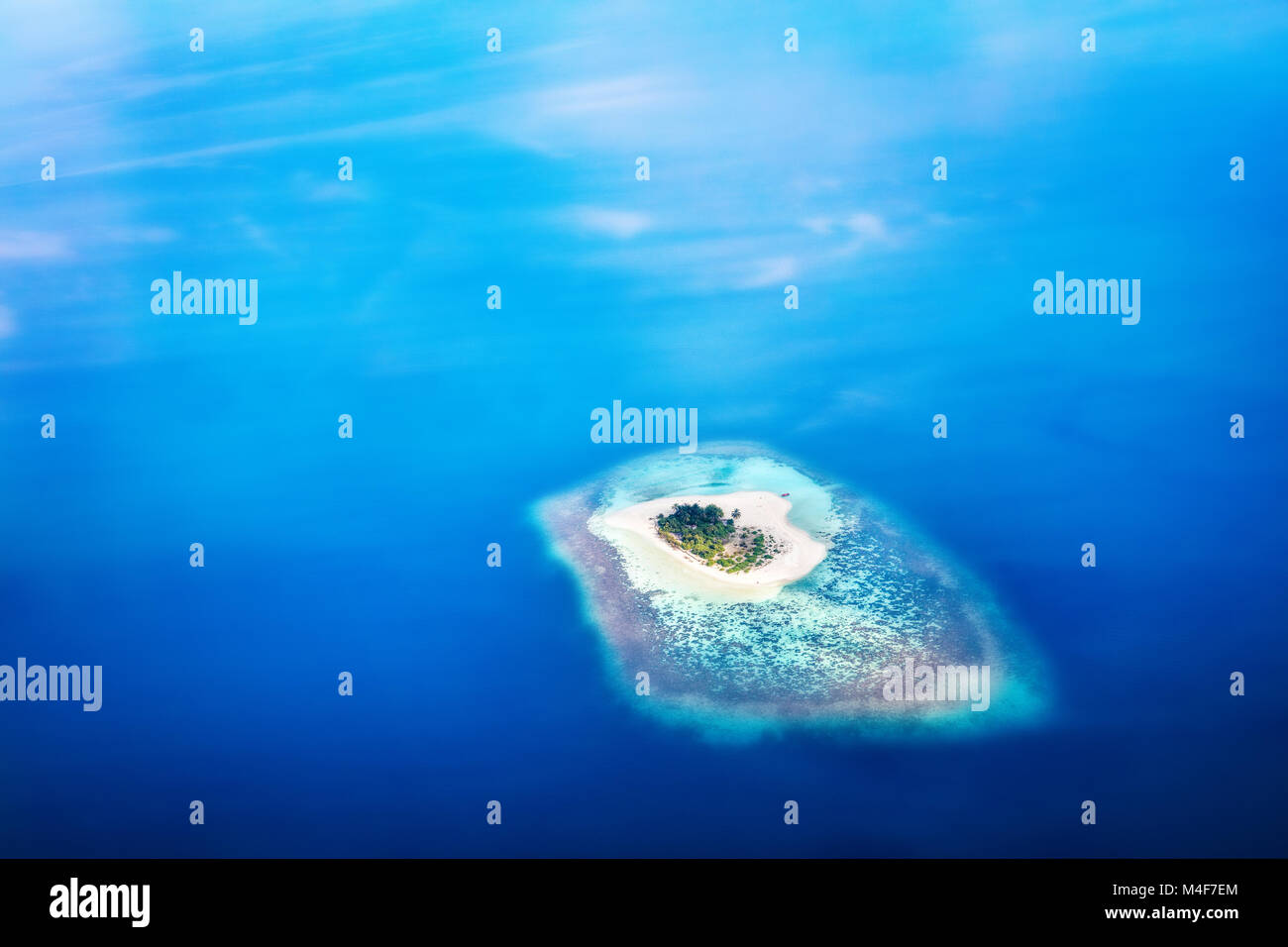 Heart shape island in Maldives, Indian Ocean Stock Photo