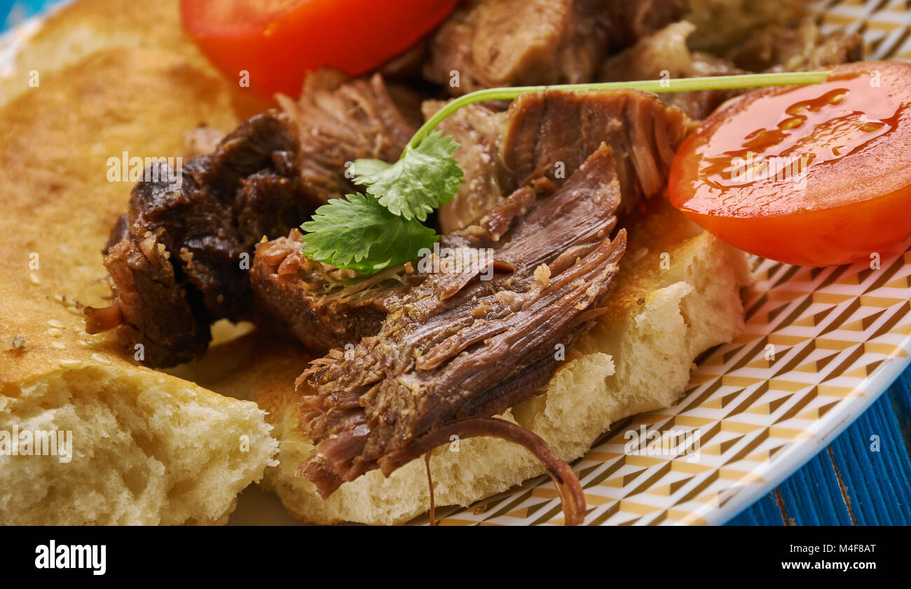 Greek roast lamb - arni sto fourno , close up Stock Photo