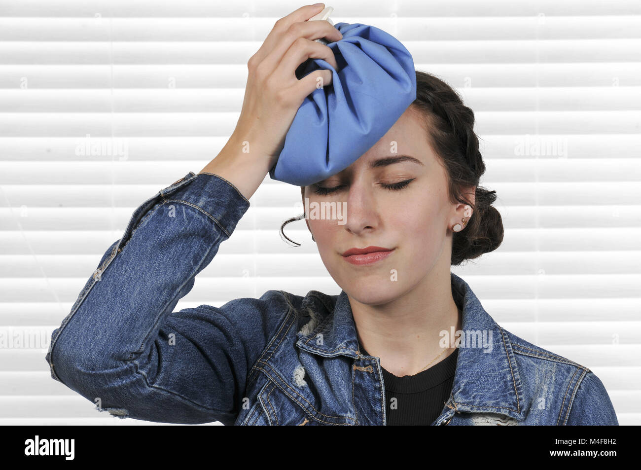 Woman with Headache Stock Photo - Alamy