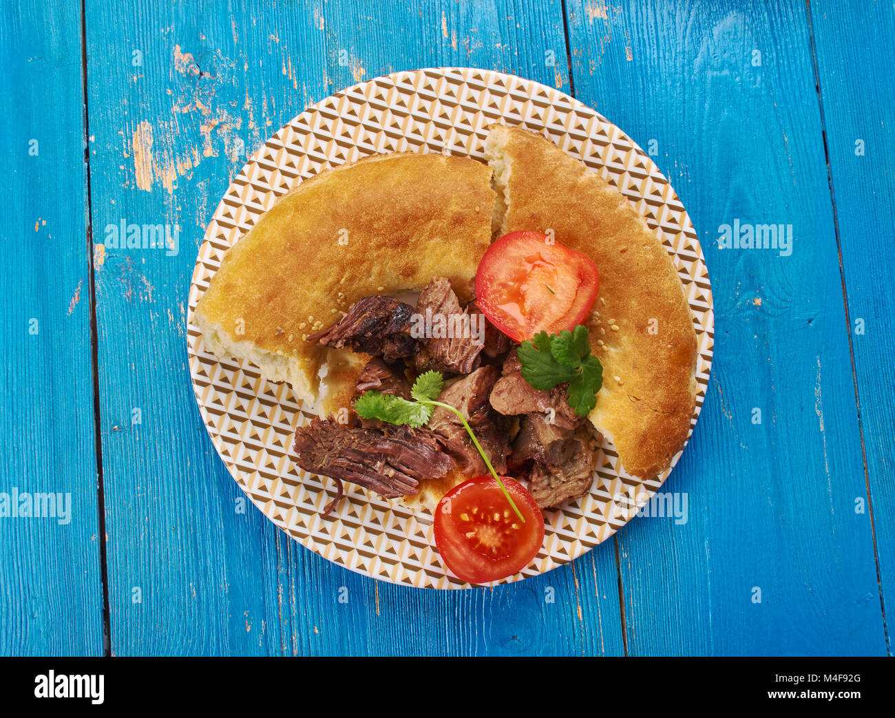 Greek roast lamb - arni sto fourno , close up Stock Photo