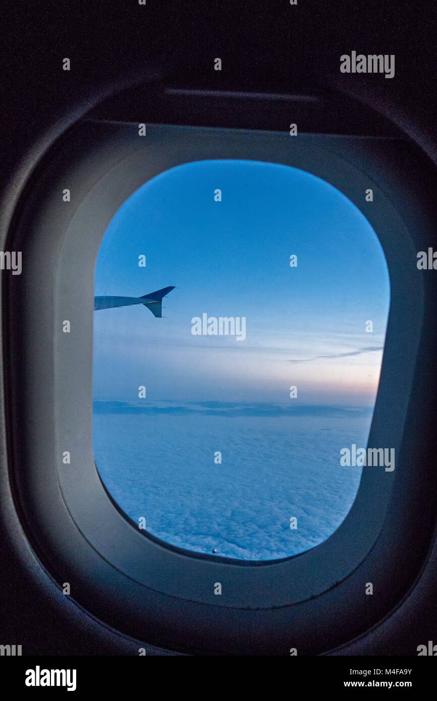 Aerial airplane clouds window cabin looking out wing hi-res stock ...