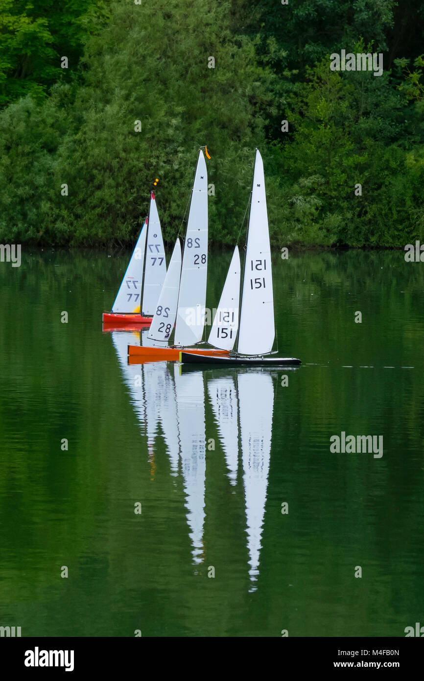 Radio controlled racing sailboats. Stock Photo