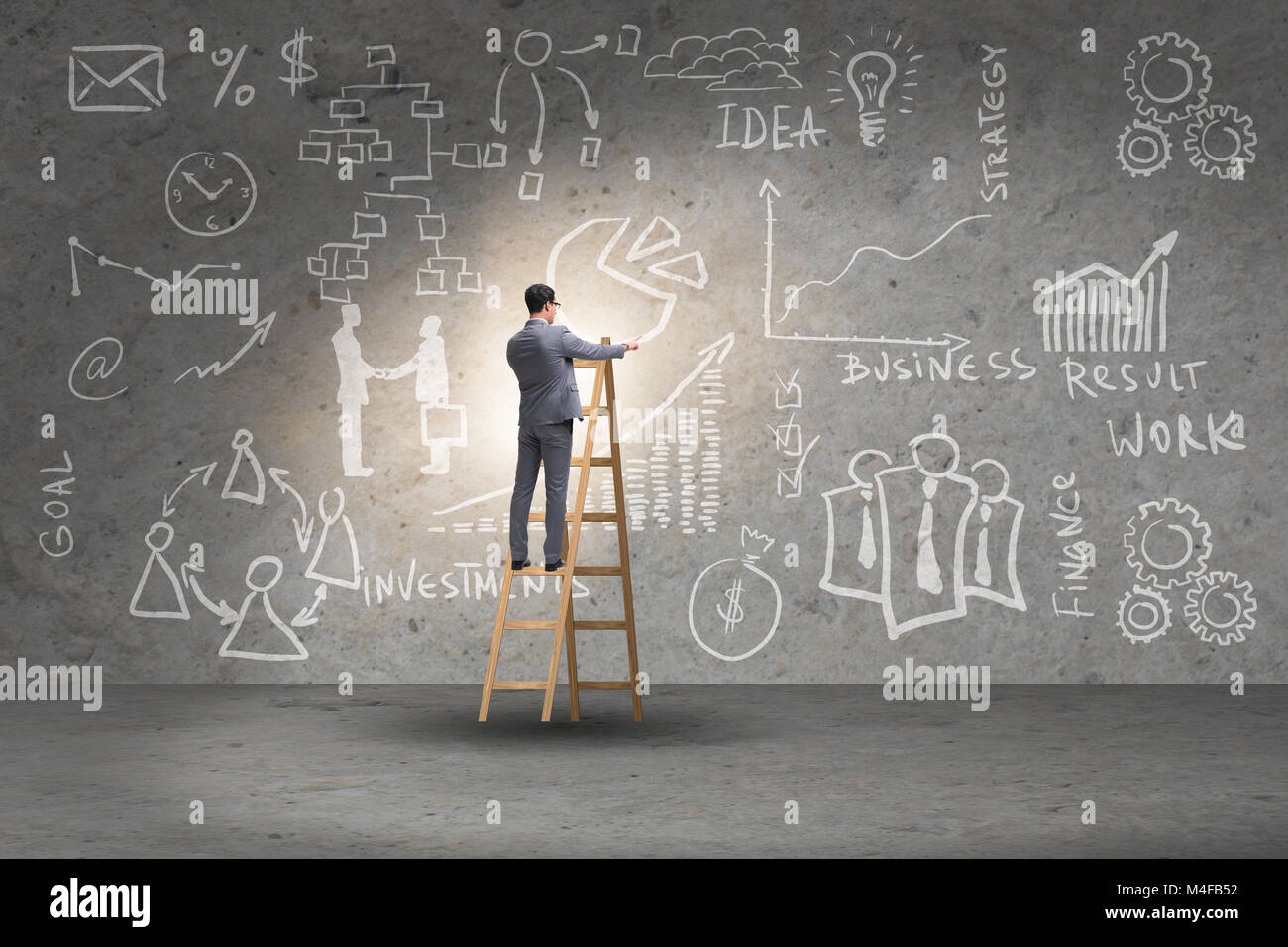 Businessman on ladder in business concept Stock Photo - Alamy