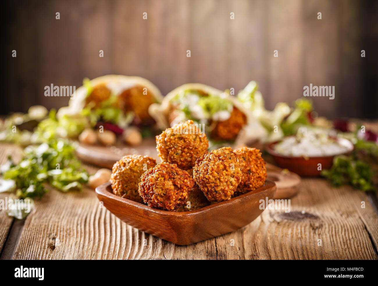 Fresh falafel balls on a wooden bowl Stock Photo