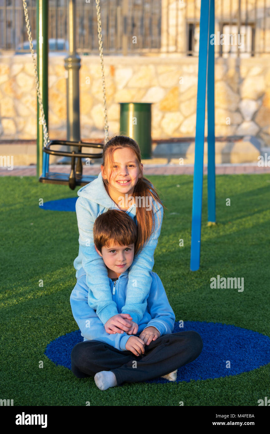 Brother sister smiling park hires stock photography and images Alamy