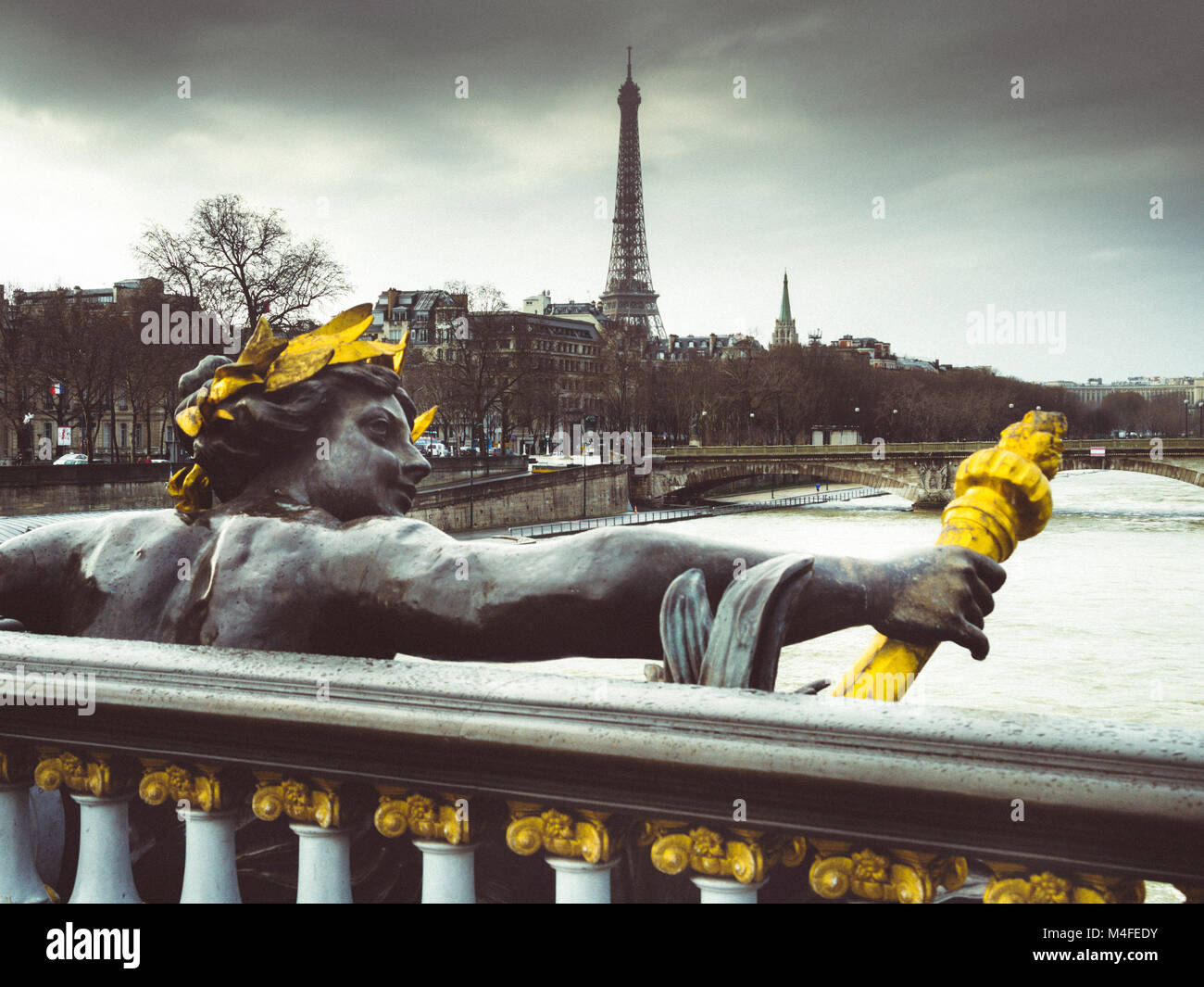 Statue on the Pont Alexandre III in Paris, France Stock Photo