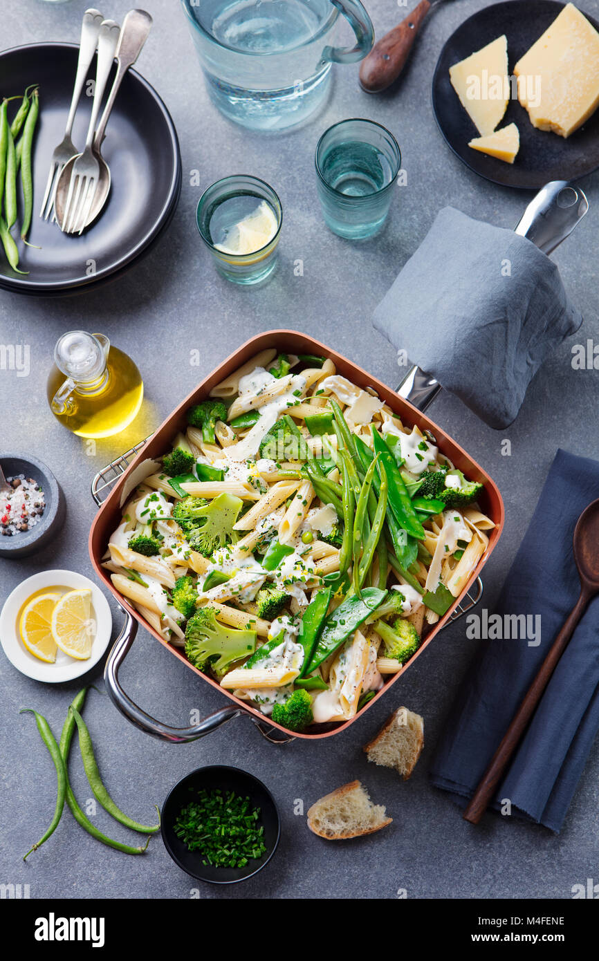 Pasta with green vegetables, creamy sauce Top view Stock Photo Alamy
