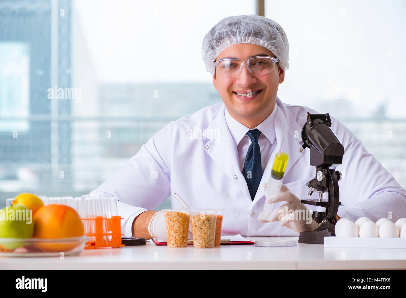 Nutrition expert testing food products in lab Stock Photo Alamy