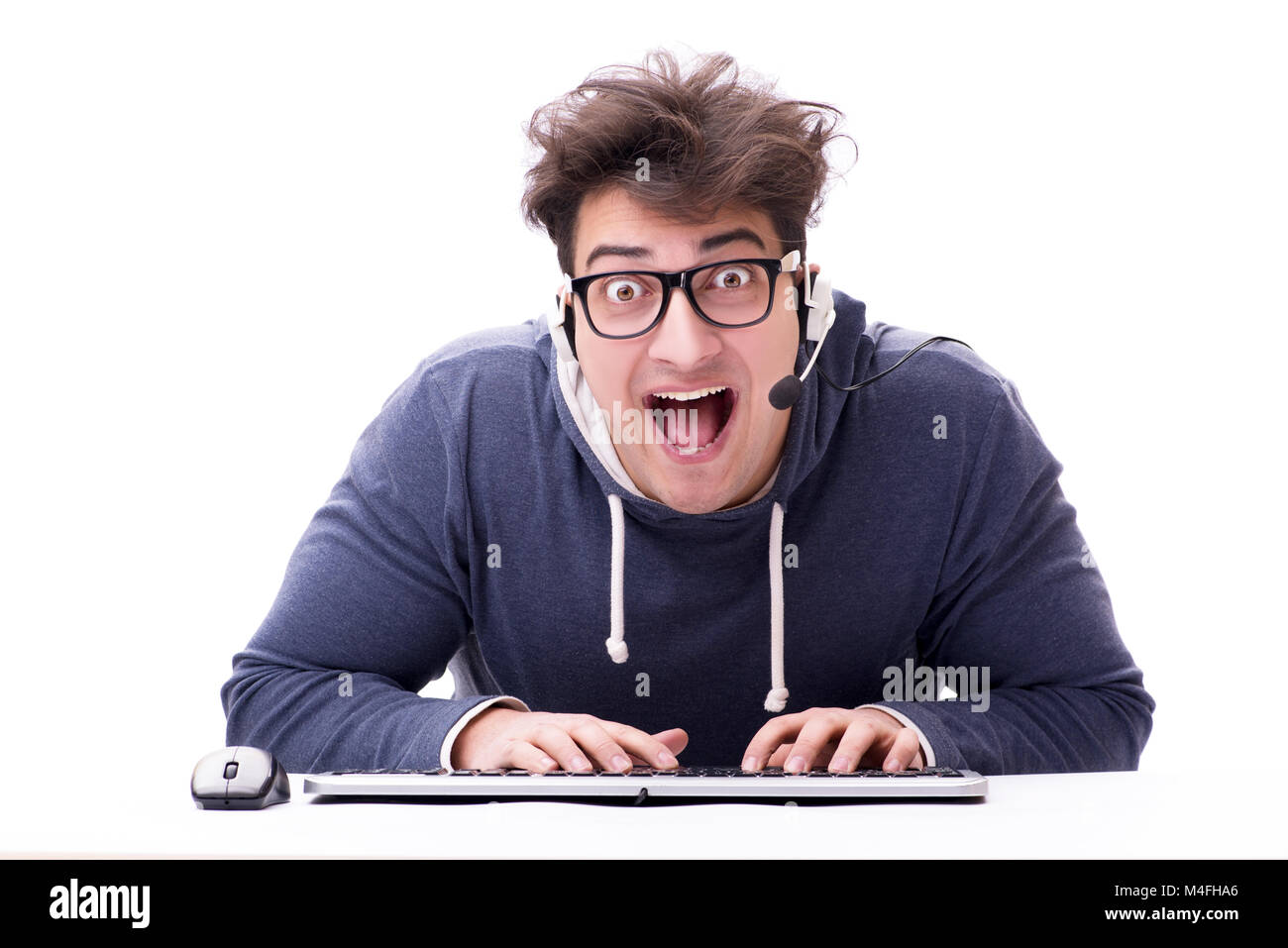 Funny nerd man working on computer isolated on white Stock Photo