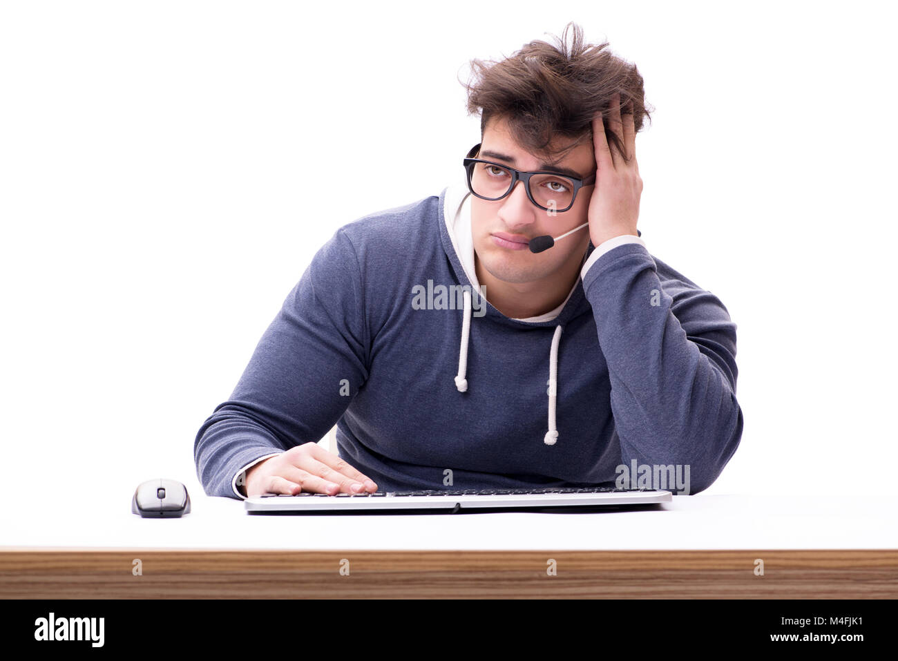 Funny nerd man working on computer isolated on white Stock Photo