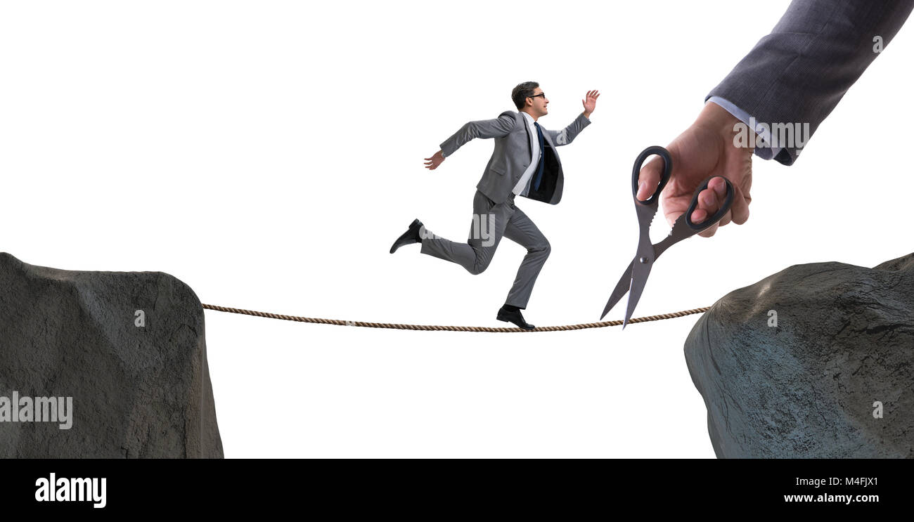 Hand cutting the rope under businessman tightrope walker Stock Photo ...