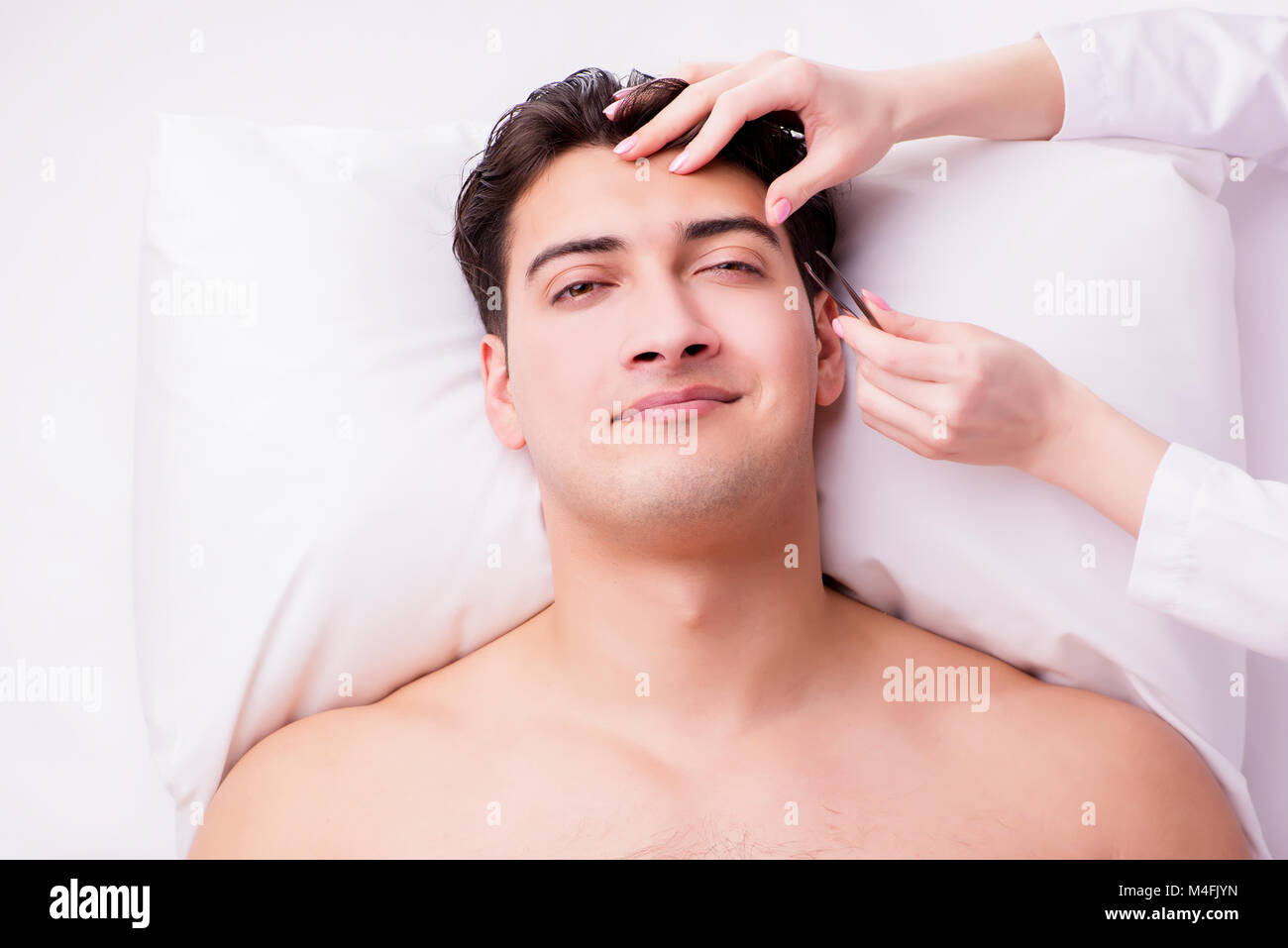 Handsome Man In Spa Massage Concept Stock Photo Alamy