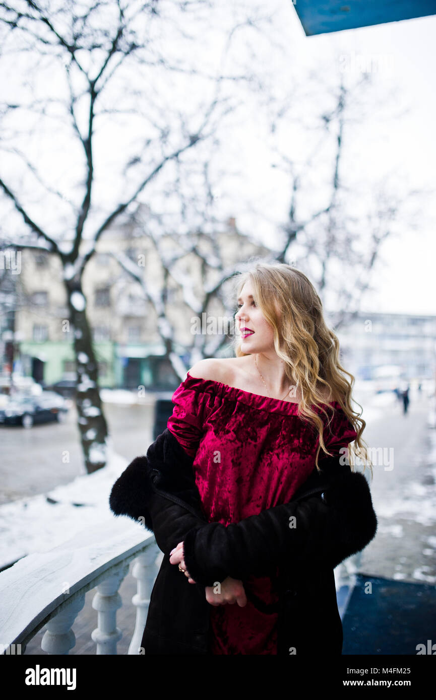 sachin and babi light blue dress Beautiful Woman with Dark Hair in Luxurious Evening Dress with Accessories  Posing in the Snowy Mountains Stock Photo