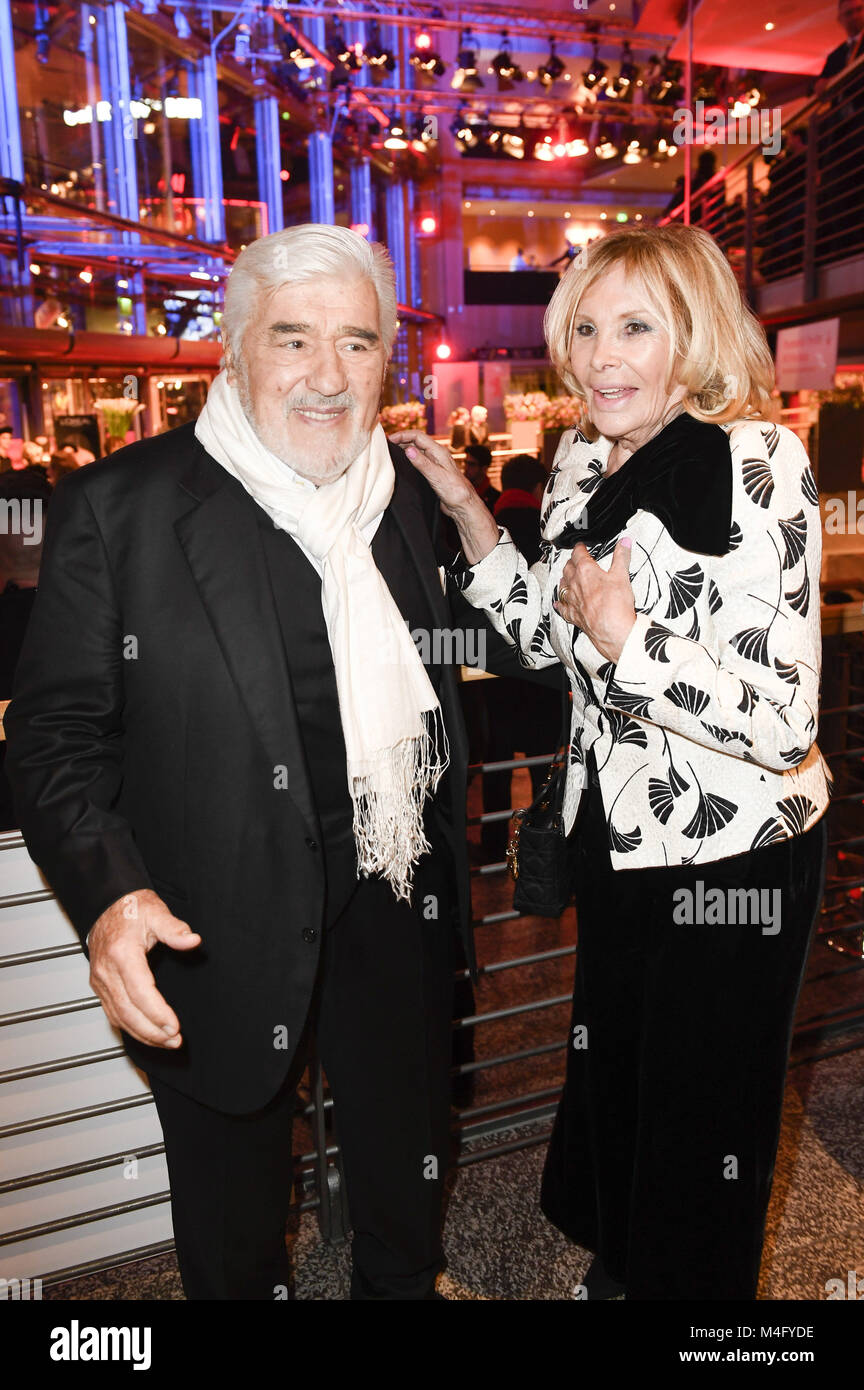 Berlin, Germany. 15th Feb, 2018. Mario Adorf and his wife Monique Faye attending the opening party during the 68th Berlin International Film Festival/Berlinale 2018 at Berlinale Palast on February 15, 2018 in Berlin, Germany. | Verwendung weltweit/picture alliance Credit: dpa/Alamy Live News Stock Photo