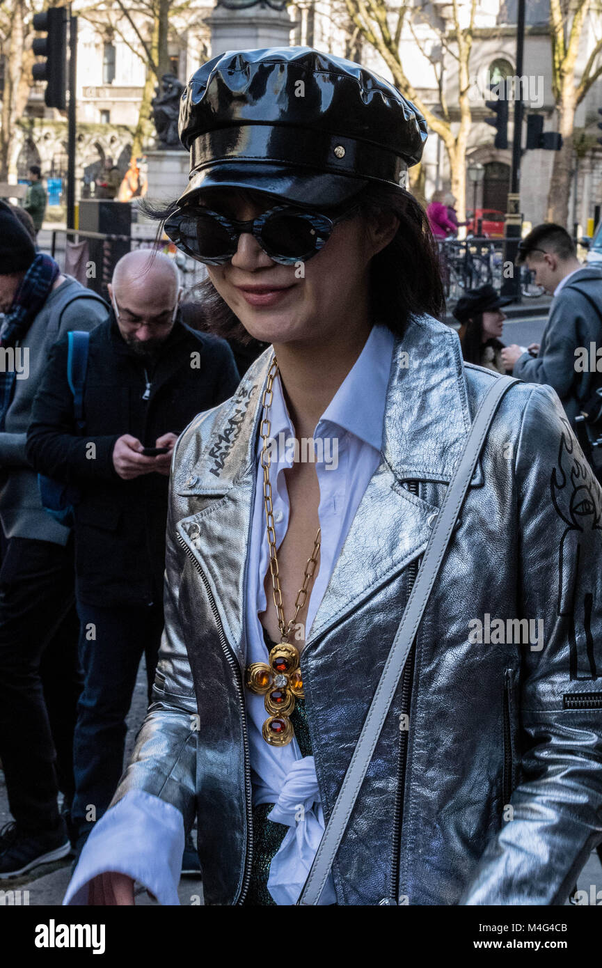 London 16th February 2018, Fashionistas outside the London Fashion Week venues; they are fashion followers or young designers trying to publiscies their designs. Credit: Ian Davidson/Alamy Live News Stock Photo