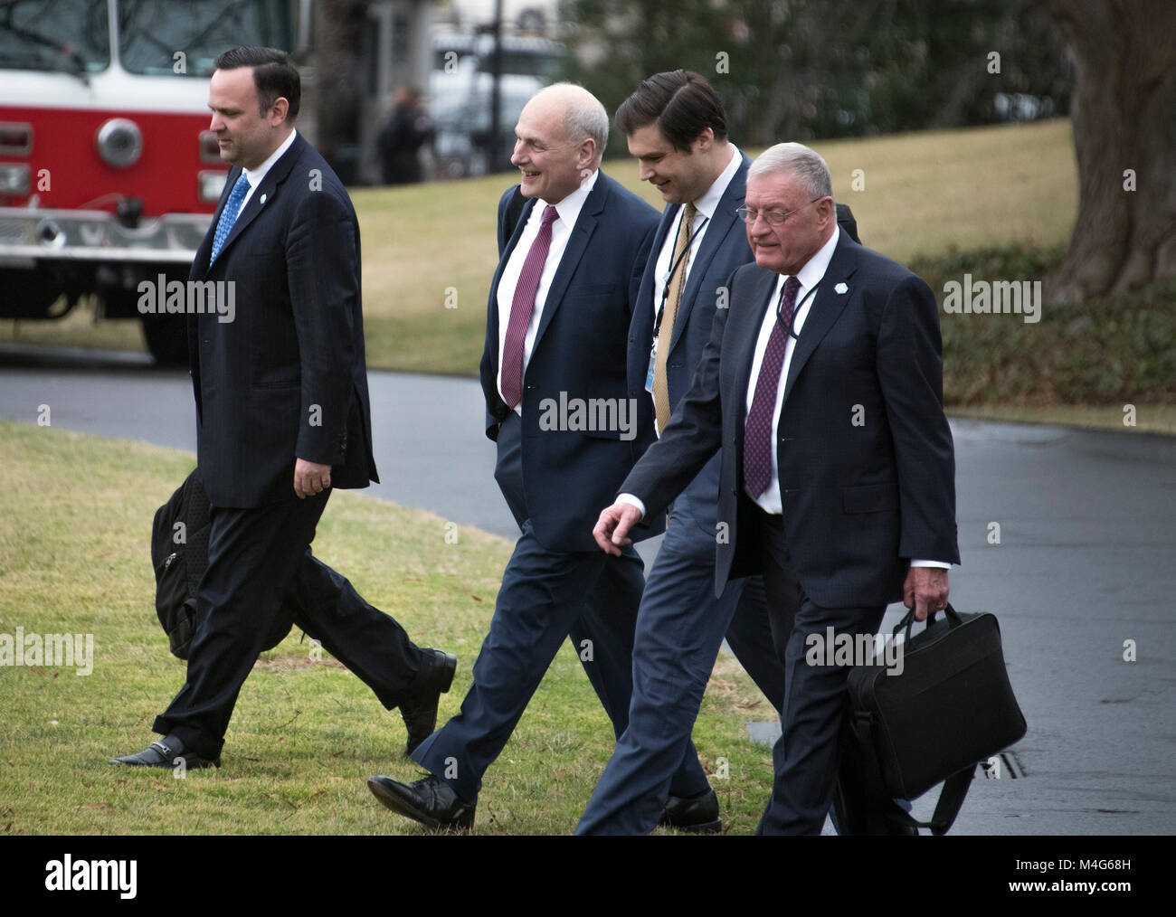 From left to right: Dan Scavino, White House Director of Social Media and Assistant to the President; General John Kelly, White House Chief of Staff; Johnny DeStefano, Assistant to President Donald Trump and Director of the Office of Presidential Personnel; and General Joseph "Keith" Kellogg Jr., chief of staff and executive secretary for the National Security Council, walk to Marine One to accompany United States President Donald J. Trump from the White House in Washington, DC for a trip to Mar-a-Lago, Florida for the week-end on Friday, February 16, 2018. Credit: Ron Sachs/CNP /MediaPunch Stock Photo
