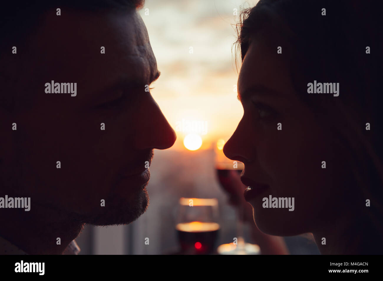 Man woman kissing greeting hi-res stock photography and images - Alamy