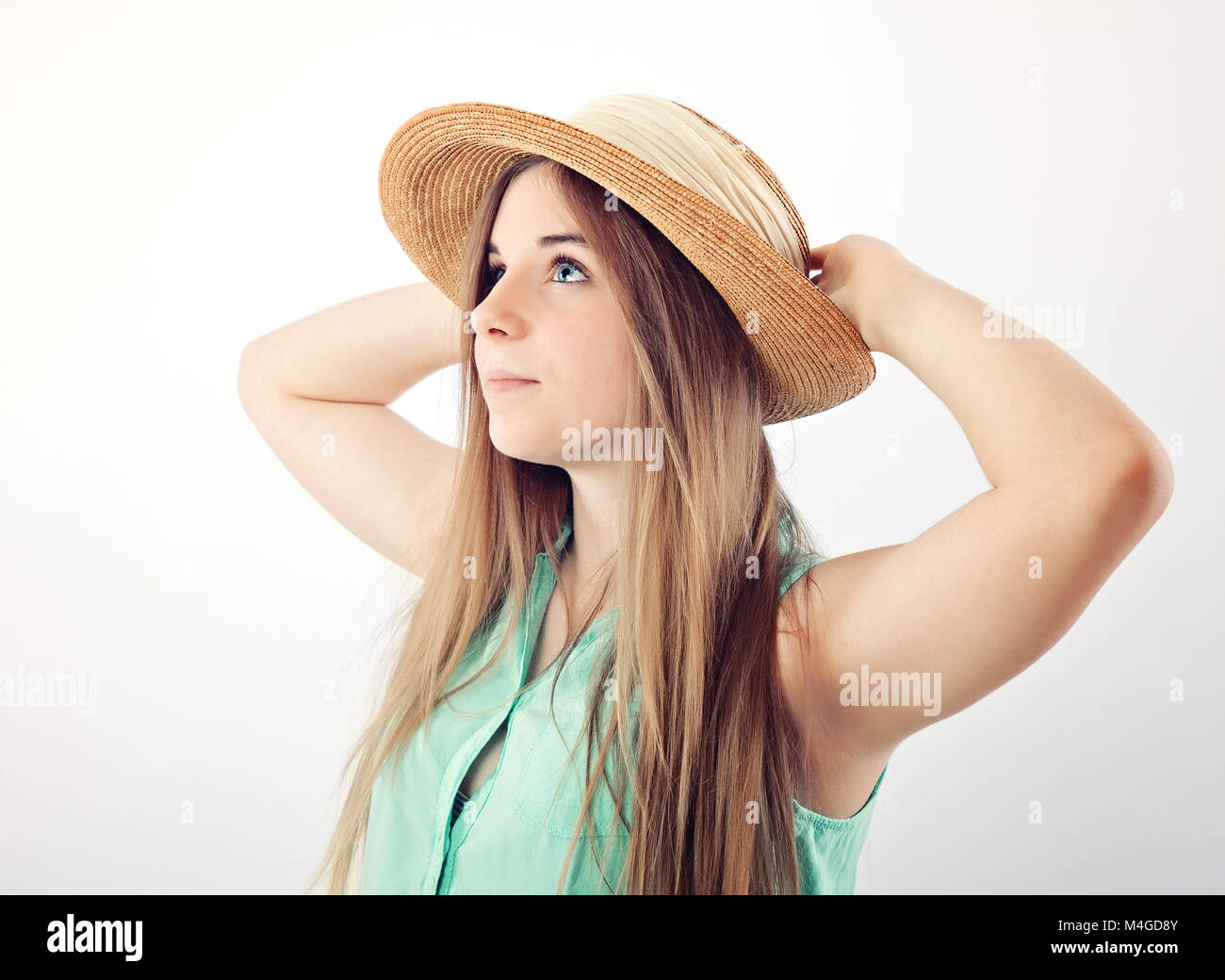 teenage girl wearing sun hat Stock Photo