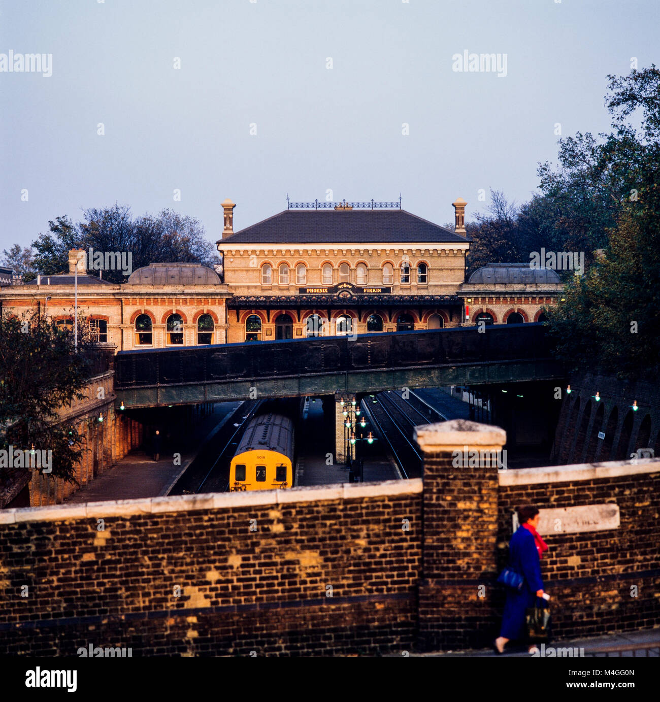 Exterior view of the Phoenix and Firkin pub, old ticket hall of Denmark Hill railway station, burnt down in 1980 then was refurbished and opened as a public house, photographed in 1987 Stock Photo