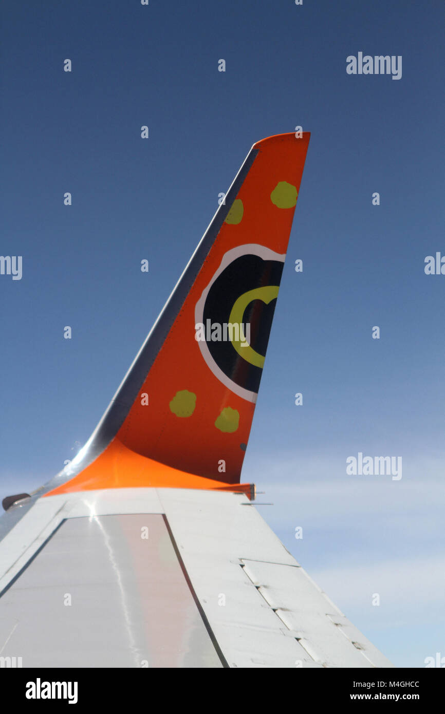 Window view of airliner wing, Mango Airlines, South Africa Stock Photo